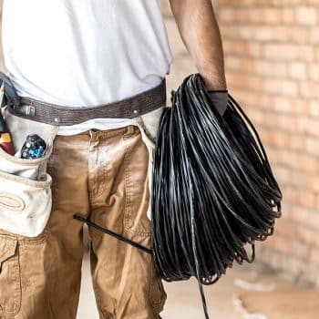 What tools should I use to pull wires through an electrical conduit?